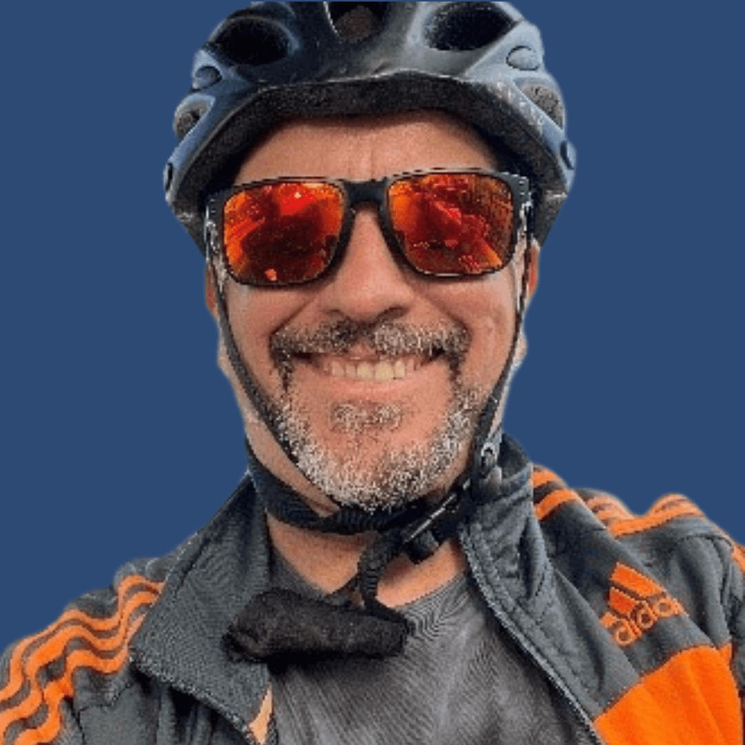 A man is wearing a helmet and glasses.
