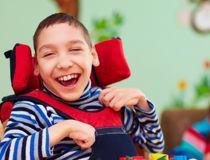 Cheerful boy with disability