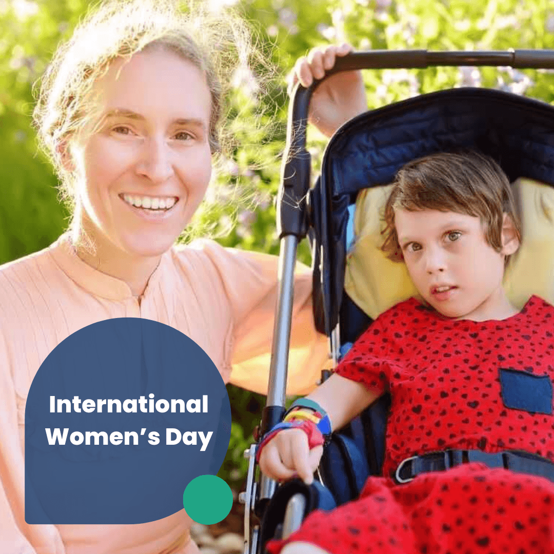 A mum is next to her daughter. Text says International Women's Day.