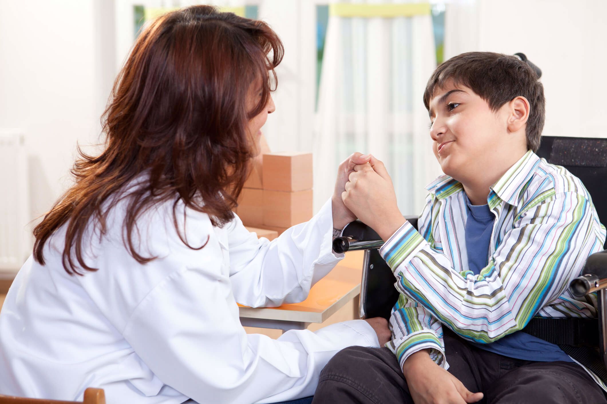 GP consulting parent about child with cerebral palsy